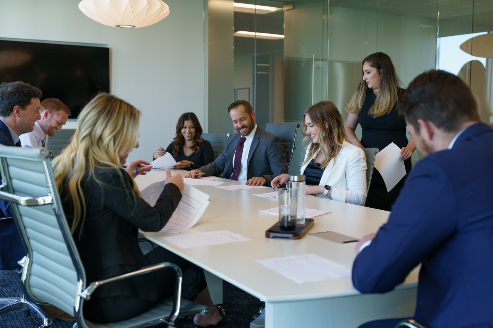 The LS Carlson Law team in a conference-room strategy session